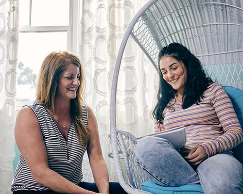 Mother and daughter doing homework together